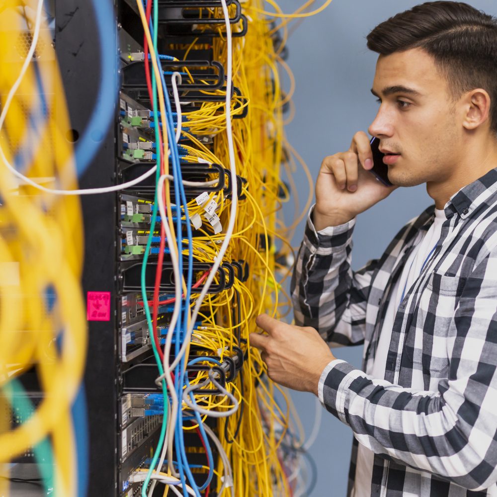 young-network-engineer-talking-phone
